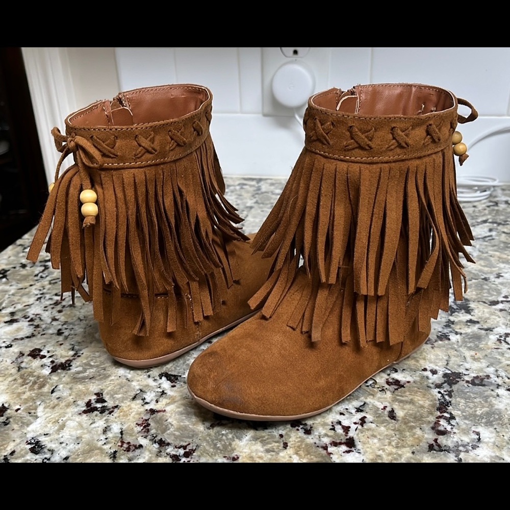 Girls Rampage fringe boots.  Never worn and in perfect condition.